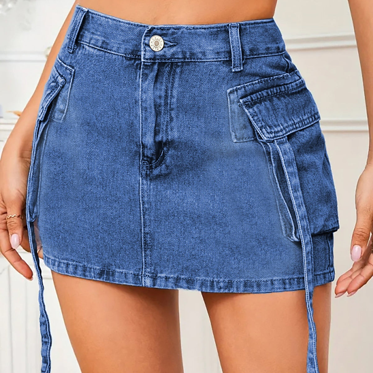 Women's Denim Skirt in sapphire blue, bodycon style with pockets and moderate stretch.